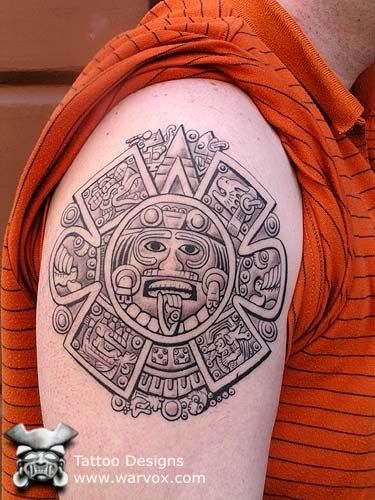 Mayan Aztec tribal arm sleeve tattoo by Hiram Cordero